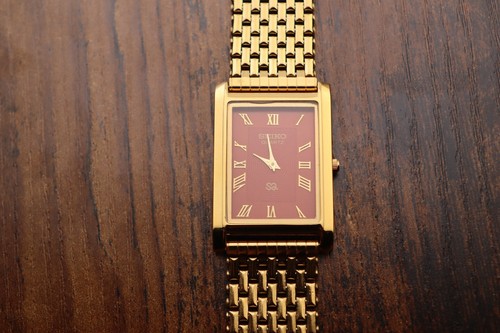 Seiko slim quartz men red - quartz,