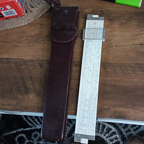Post slide rule with leather - slide,