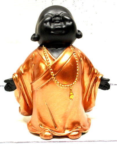 Standing little buddhist monk - standing,