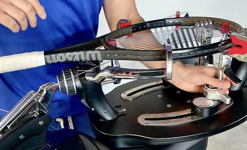 Tennis racket stringing
