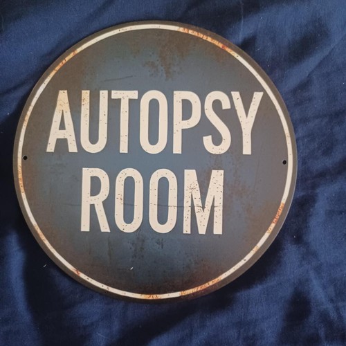 Round metal sign - metal, cave