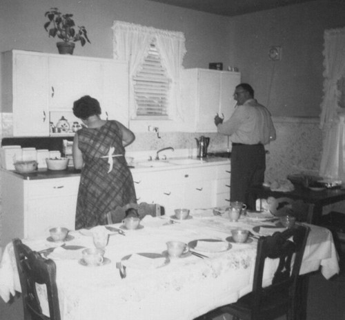 1950s couple preparing meal - preparing,