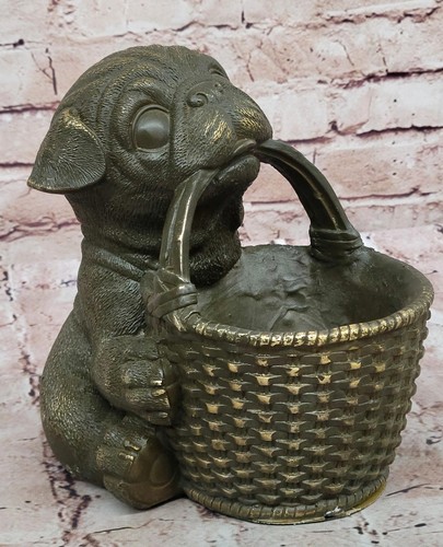 Bronze pug puppy holding woven - pug,