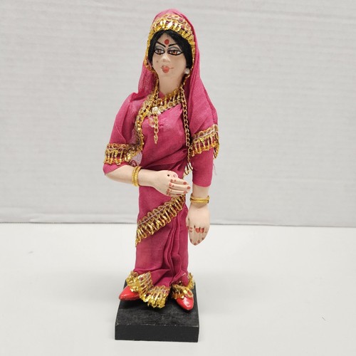Indian woman figure on - 7-1/2",