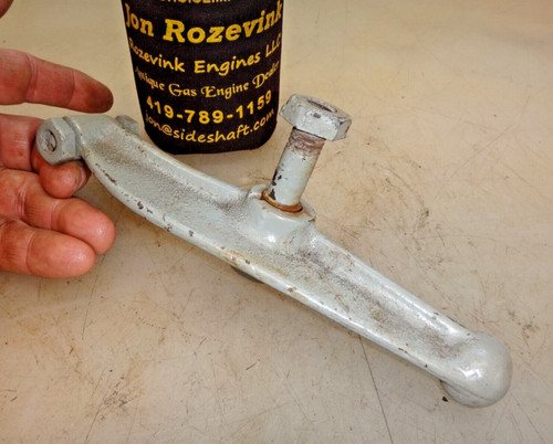 Rocker arm and mounting bolt - and,