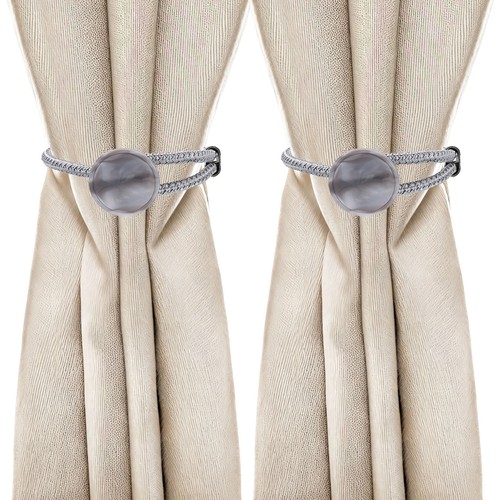 Pack curtain holdbacks with - curtain,
