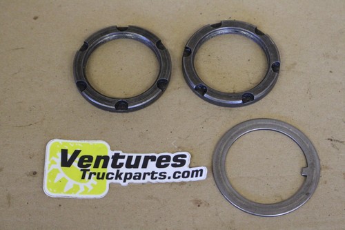Wheel end spindle nuts and - end,