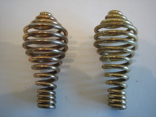 Pair gold tone wood stove - pair,