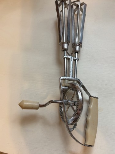 Vintage hand crank egg - hand,