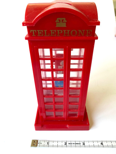 Red plastic british telephone - plastic,