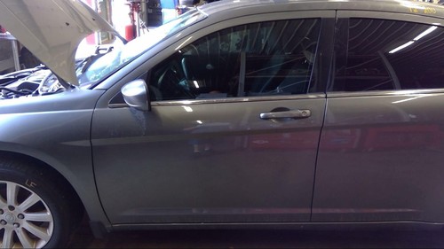 Used front left door assembly - front,