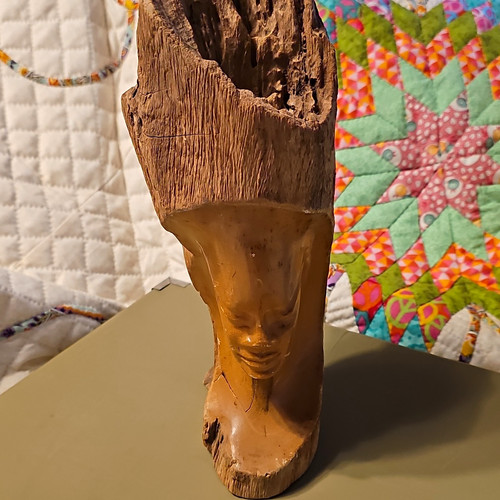 Hand carved wooden face - hand,