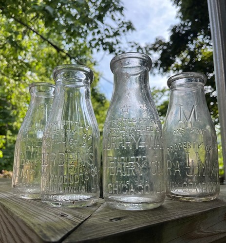 Vintage pint milk bottles from - milk,
