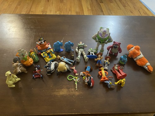 Disney and pixar figurines - and,