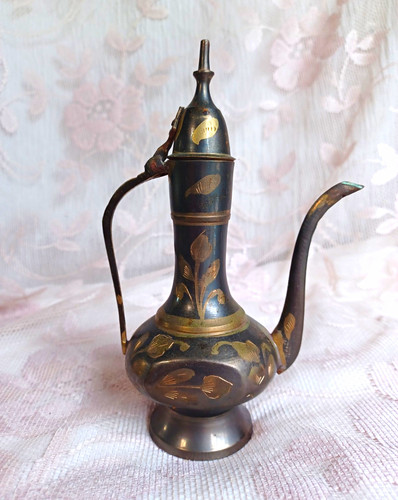 Vintage brass tea pot with - tea,