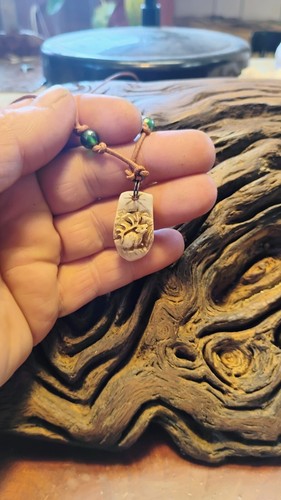 Bugling elk carved tooth - carved,