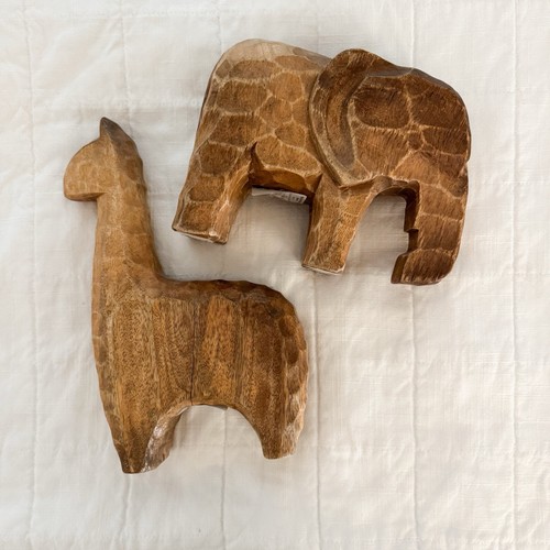 Wooden hand carved animal - hand,