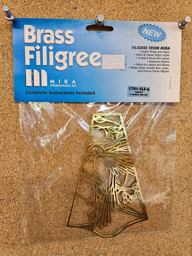 Parrot filigree brass by - parrot,