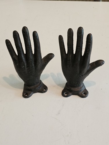 Cast iron hand - hand, bookends