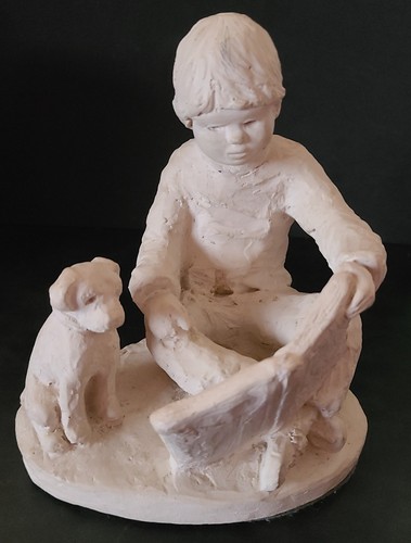 Austin sculpture boy reading - austin,