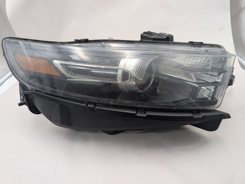 Used right headlight assembly - right,