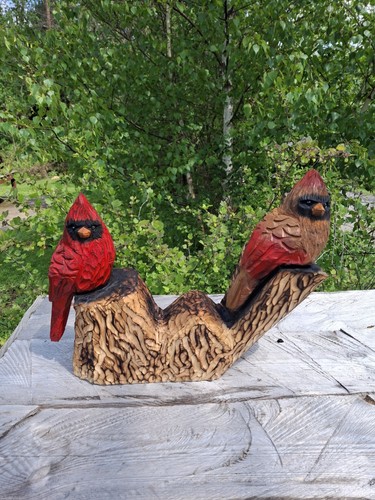 Chainsaw carved cardinals - chainsaw,