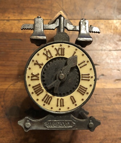 Die cast miniature clock - cast,