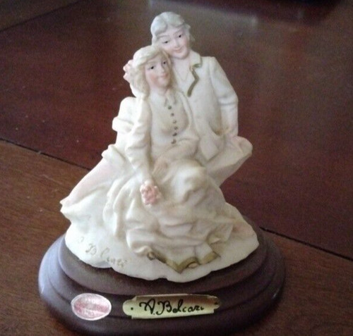 Belcari figurine seated - ,