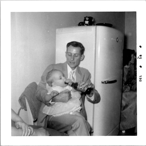 Father giving baby beer soda - baby,