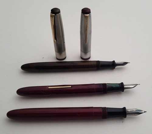 Three vintage wearever - three,