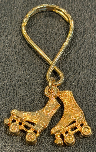 Vintage gold tone metal roller - tone,