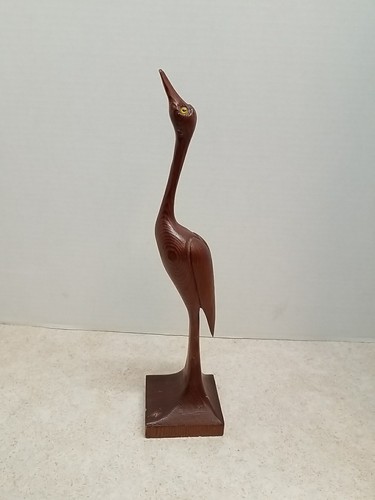 Wood hand carved heron - hand,