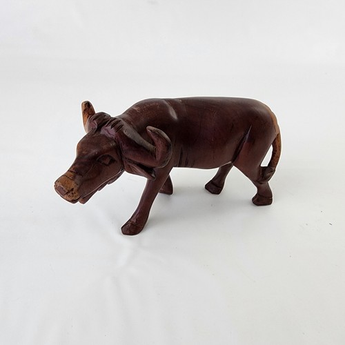Hand carved wood water - hand, buffalo