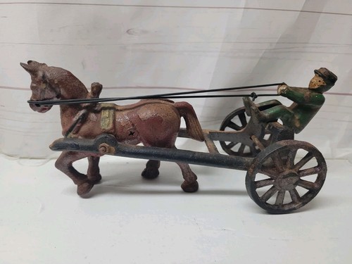 Cast iron horse and sulky - cast,