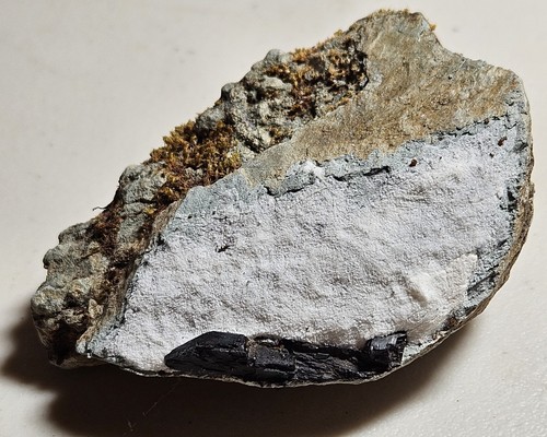 Joaquinite with neptunite - with,