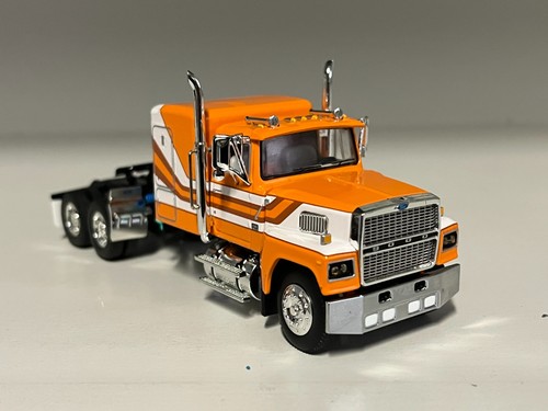 Dcp orange white ford - ford, ltl