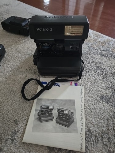 Poloroid one step - step,
