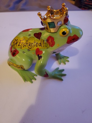 This fanciful frogs figurine - this,