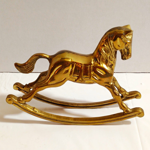 Gold tone metal rocking - tone,