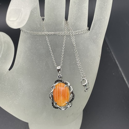 Orange spiny oyster shell - orange,