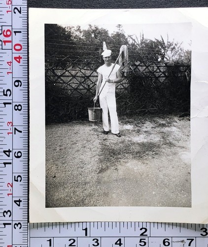 Sailor holding mop and - mop,