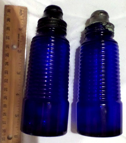 Salt and pepper shakers - and,
