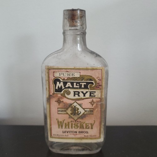Pure malt rye whiskey bottle - malt,