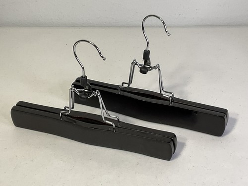 Lot two black wooden pant - two, /
