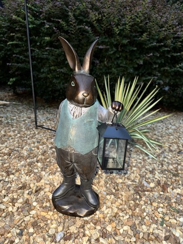 Garden rabbit statue holding - rabbit,