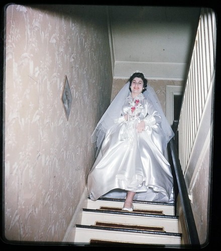 Bride coming down the - , stairs