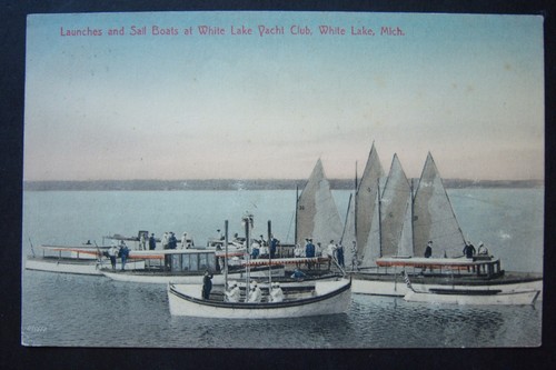 Launches sail boats at - boats, white
