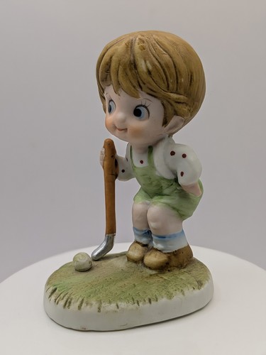 Lefton boy playing golf - golf, golfer