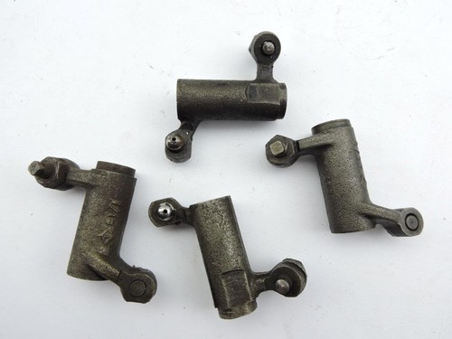 Intake and exhaust rocker arms - and,