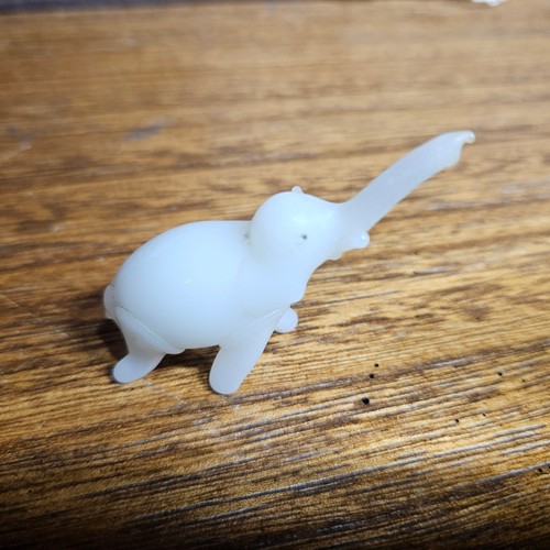 Tiny white glass elephant - tiny,